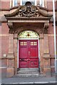 Door and pediment