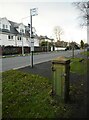 Old electricity junction box and bus stop