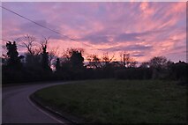 TL0954 : Sunset over Renhold Road, Sevick End by David Howard