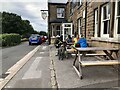 Cyclists enjoy a pint