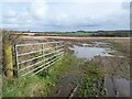 Muddy field entrance, near Bunson