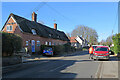 TL6943 : Sturmer: pretty cottages and the postman by John Sutton