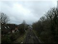 Looking south-west along the railway track from Tilmore Bridge