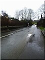 Water cascading down Windle Royd Lane