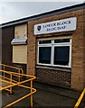 Bilingual name on a Cwmbran High School building