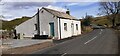 NY8015 : Milkingstile Cottage on NW side of B6276 by Roger Templeman