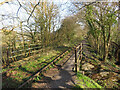 Footpath, bridge and disused railway line near Pontyates