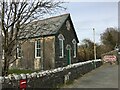 Church and bus stop beside the A494