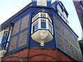 Bay window with ship?s figurehead below it