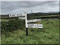 Old direction sign at the crossroads of the A356 and A3066