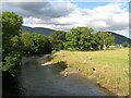 NY2523 : The River Derwent at Long Bridge by Adrian Taylor