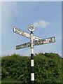 NY3458 : Direction Sign â€“ Signpost at Monkhill in Beaumont parish by D Phillips