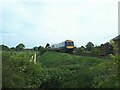 Train passing Parker Lane level crossing