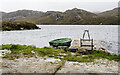 NG8378 : Boat at jetty on Loch Tollaidh by Trevor Littlewood