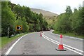 NM7882 : Pipe-laying on the A830 to Mallaig by Alan Reid