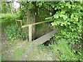 SU7956 : Elvetham - Small wooden footbridge over stream by Rob Farrow