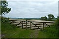 Gates onto a chalky field