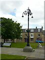 NJ3458 : Early 20th century lamp in The Square, Fochabers by Alan Murray-Rust