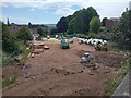 Bull Meadow, Exeter, the valley of the Shute Brook, with construction equipment