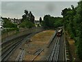 TQ4488 : Central line train emerging at Newbury Park by Stephen Craven
