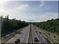 Looking down the North Circular from overpass at Epping Forest