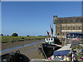 Moored boats at Standard Quay, with Oyster Bay House, Faversham