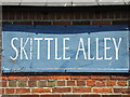 Skittle alley sign