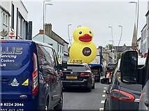 H4572 : Large inflatable duck passing through Market Street, Omagh by Kenneth  Allen