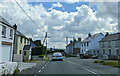 Houses and car on the A487 at Llwynduris