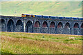 SD7679 : Goods Train Crossing the Ribblehead Viaduct (north to south) by David Dixon