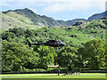 Helicopter landing at hotel in Borrowdale