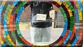 TQ9120 : Mosaic mirror in shop window on The Deals by Ian Cunliffe