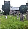 SO3227 : Churchyard headstones and trees, Clodock, Herefordshire by Jaggery