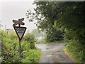 Old Level Crossing and Give Way signs