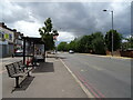 Bus stop and shelter on Stonecot Hill (A24)