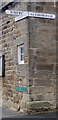 Sign at the junction of Lodge Lane and High Street (A174), Lythe