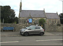 ST0080 : Bench and car outside St Illtyd's churchyard, Llanharry by Jaggery