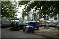 Cars parked beside Poplar Dock