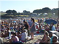 A crowded Gyllyngvase beach awaiting the Red Arrows display