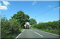 A494 north at Glan-yr-Afon village sign