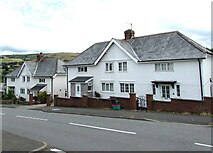 SN9768 : White houses, Rhayader, Powys by Jaggery