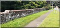 Parapet of bridge over Cairn Beck on NW side of A69 near Corby Hill sign