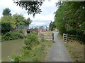 Gate on the towpath, and bridge 63 over the Stratford-upon-Avon Canal