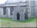 Sealed doorway in side of church