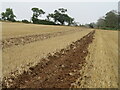 NT8763 : Stubble field near Lemington by M J Richardson