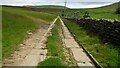 Paved farm track to Hud Clough