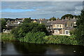 Riverside view of buildings on Ratcliffe Road, Haydon Bridge