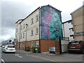 Block of flats with mural, on St George