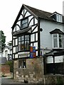 Tewkesbury: black and white house with banners