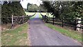 Weak bridge taking track over stream towards Eye Kettleby Hall